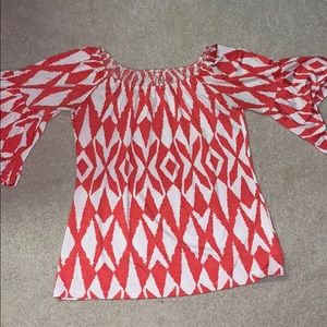 Orange pattern shirt with bell sleeves